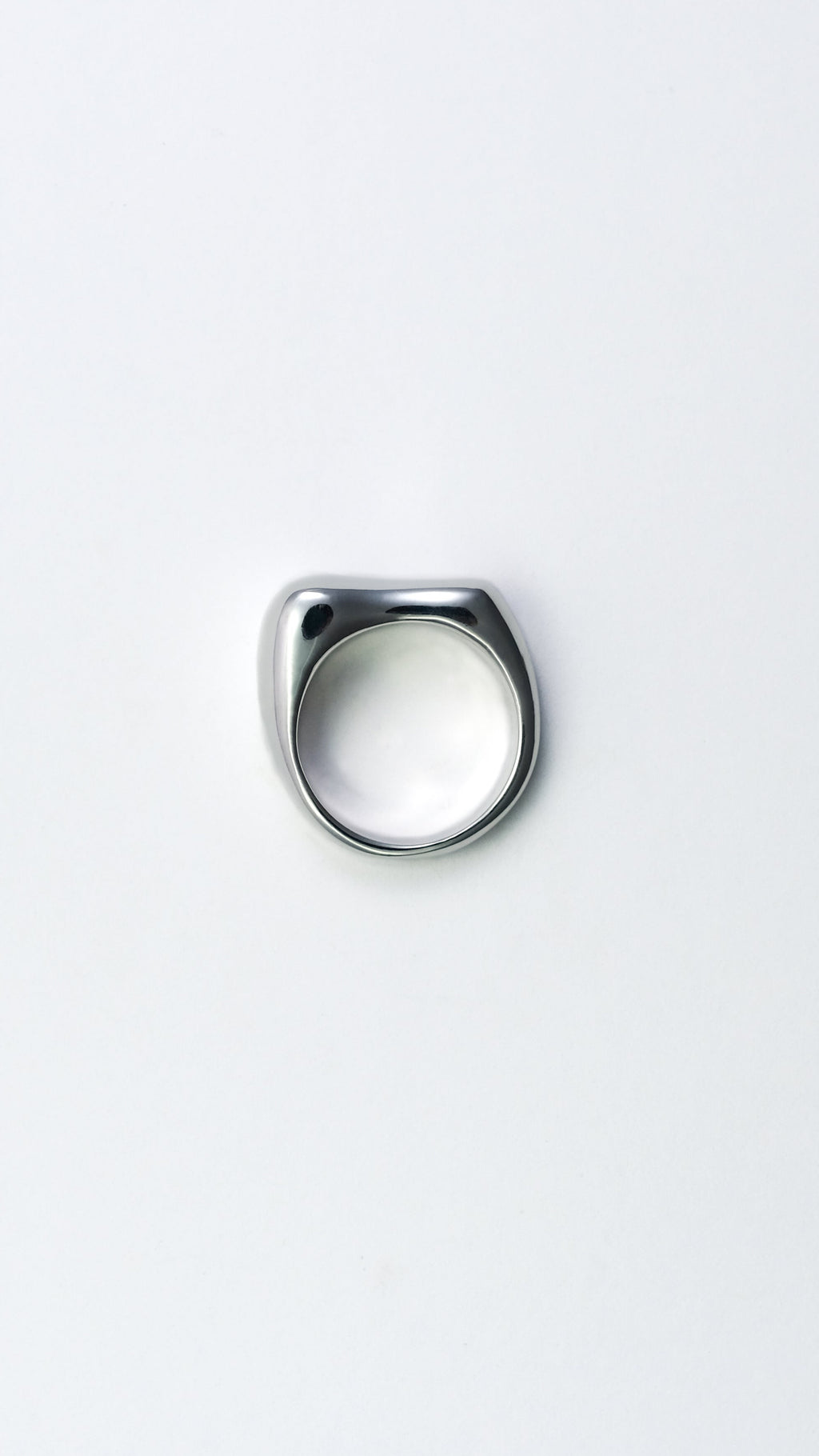 Silver ring on a white background