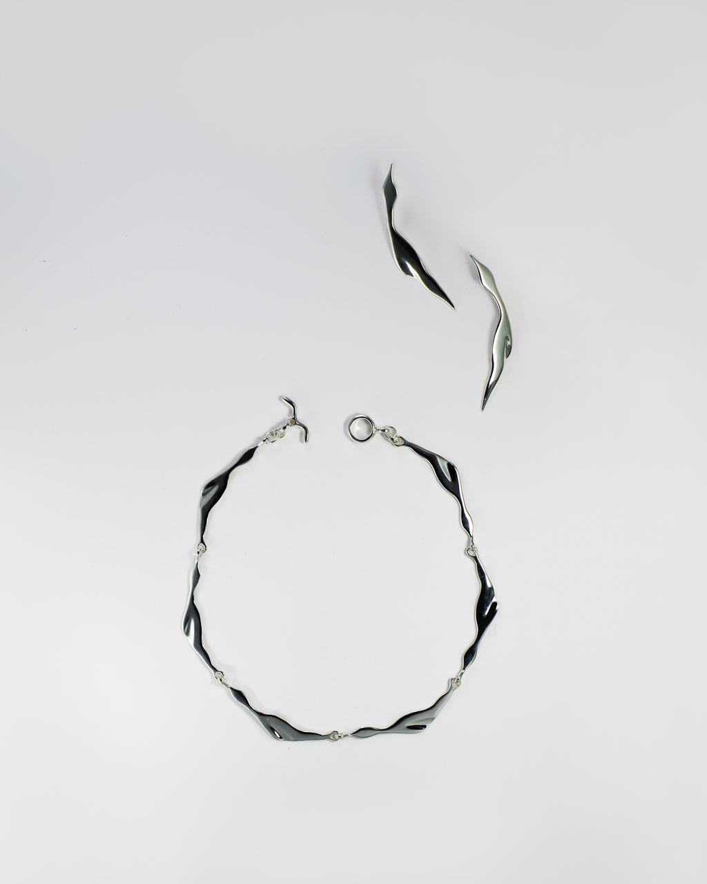 Garzas Necklace & Garzas Earrings