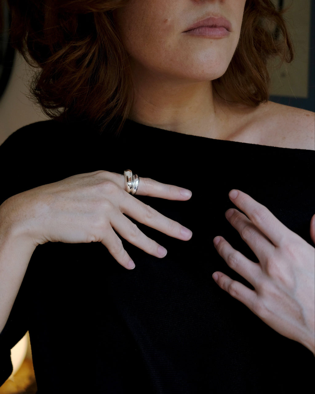 model wearing stack of rings in sterling silver